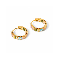 A pair of gold hoop earrings embellished with small, colorful square gemstones in pink, green, and light blue, set against a plain white background.