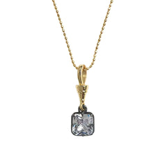 A gold chain necklace with a square cushion-cut clear gemstone pendant set in a dark metal bezel, shown against a plain white background.